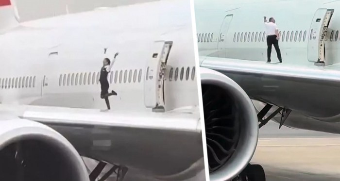 Бортпроводники устроили танцы на крыле Boeing 777, вызвав возмущение Бортпроводники устроили танцы на крыле Boeing 777, вызвав возмущение